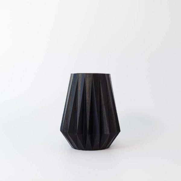 Buddy pet urn. Image of folded origami urn in black.